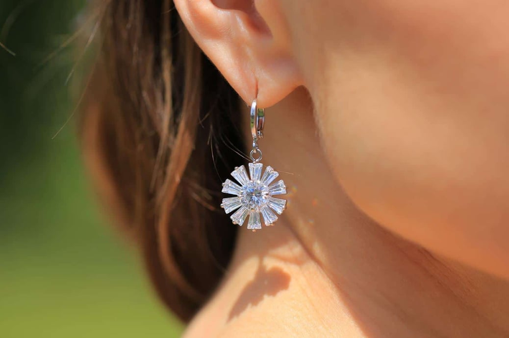 Crossdressing with silver earrings