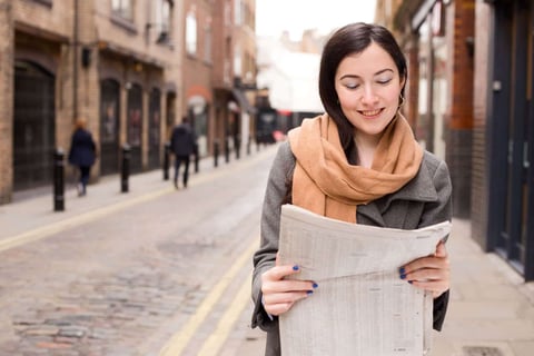 Crossdressing to pick up newspaper