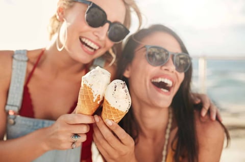 Girlfriends eating ice cream